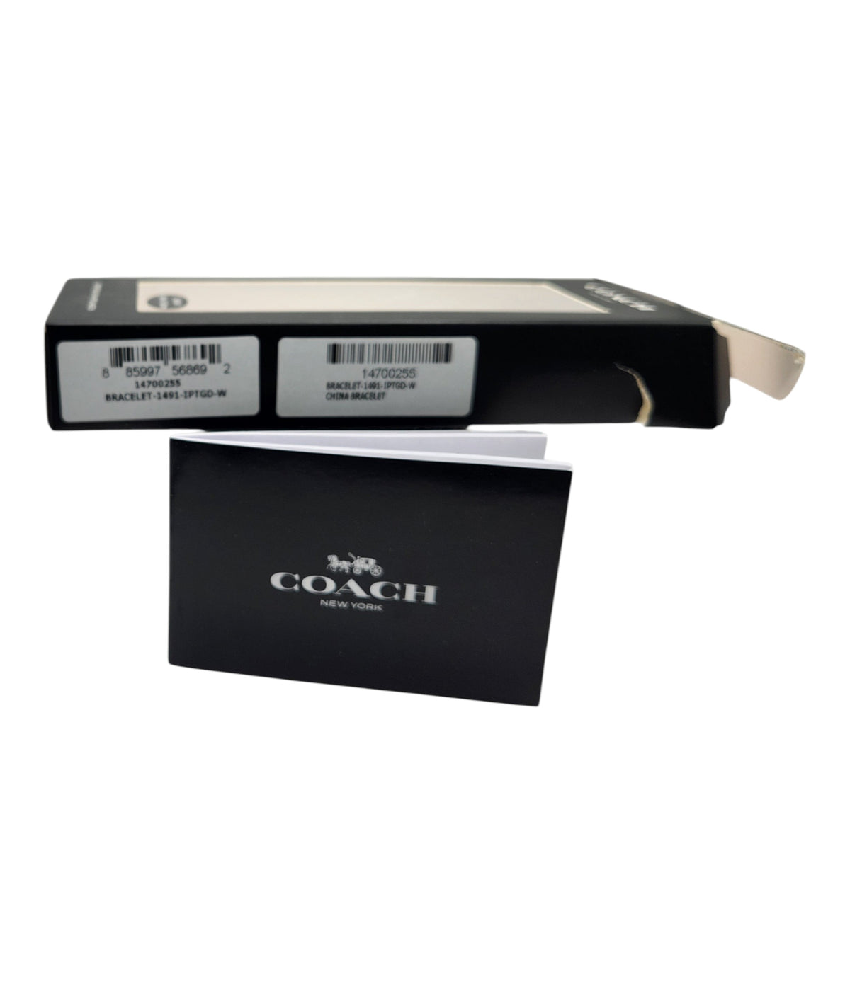 CURATED by Kira Coach New York branded product box and informational booklet for a gold mesh Apple Watch band