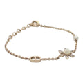 CURATED by Kira: Dior gold chain bracelet with CD logo, pearl, and crystal flower accent. Approx. 19cm.