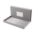 CURATED by Kira Dior grey pencil and notebook set in a branded presentation box with houndstooth pattern