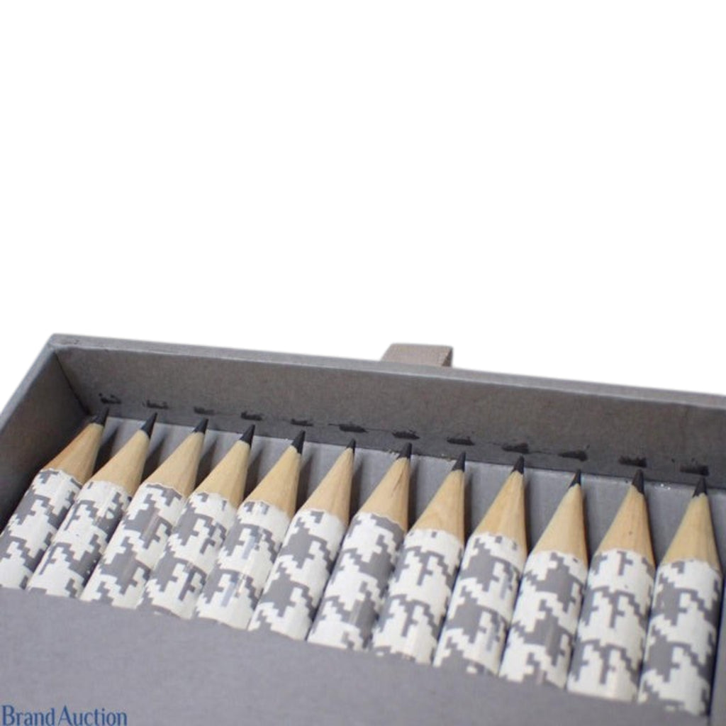 CURATED by Kira Dior pencil set in a grey box featuring a white and grey houndstooth pattern on the pencil barrels