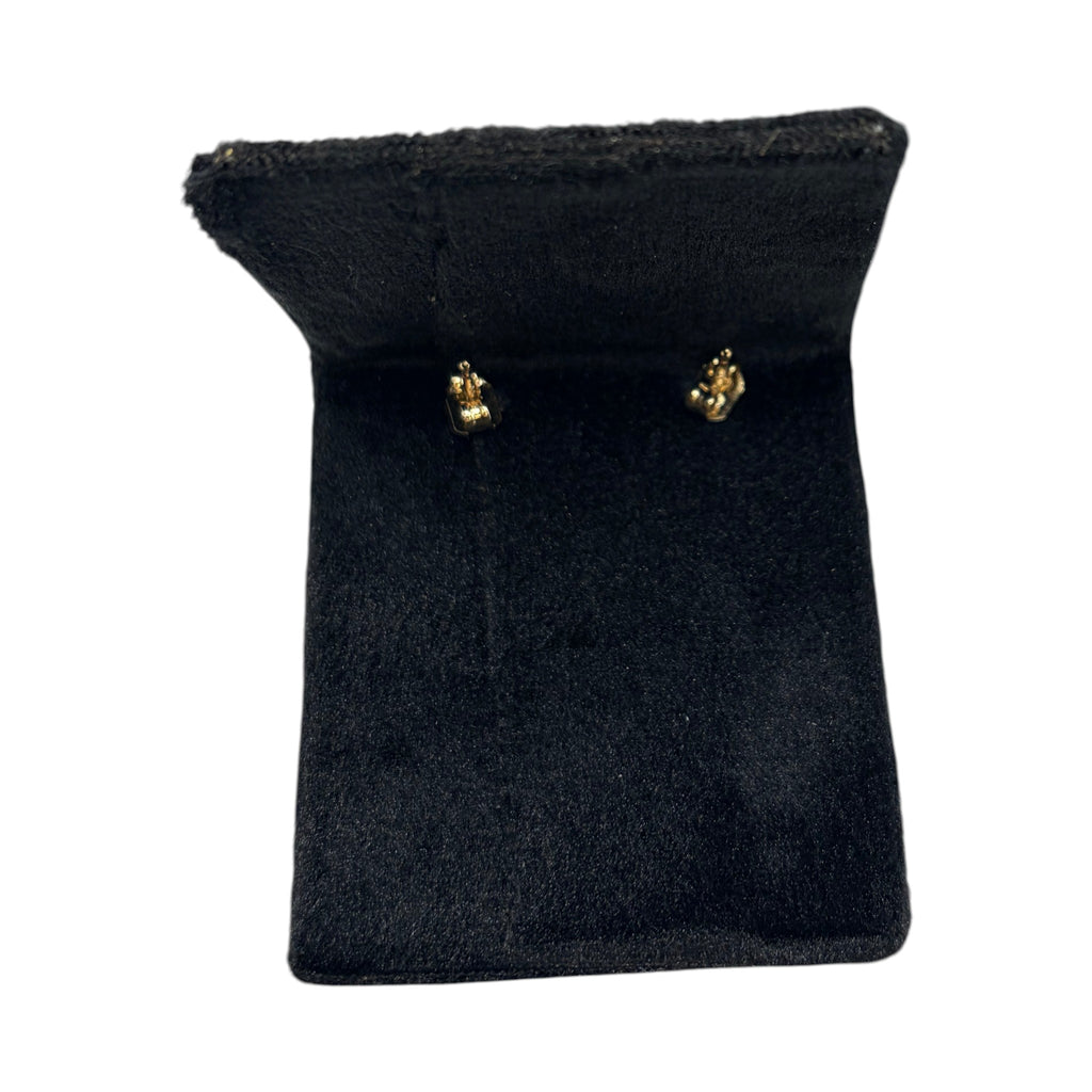 CURATED by Kira Disney Mickey Mouse gold stud earrings with cubic zirconia accents on a black velvet display stand
