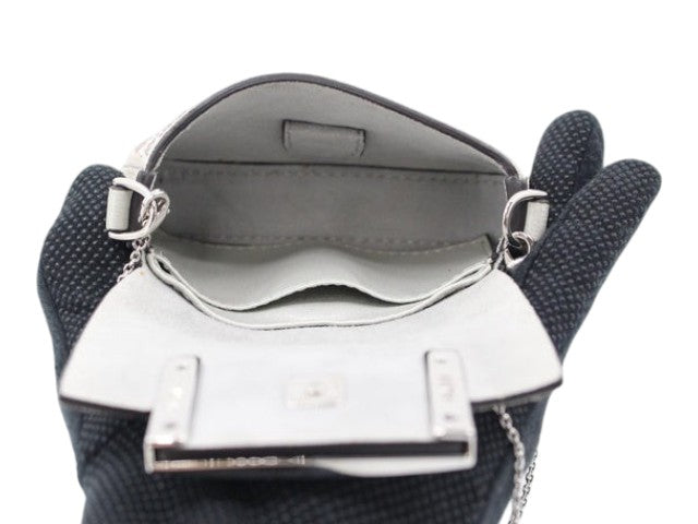 CURATED by Kira Fendi Nano Baguette bag in blue, showing the open interior compartment and silver chain strap.