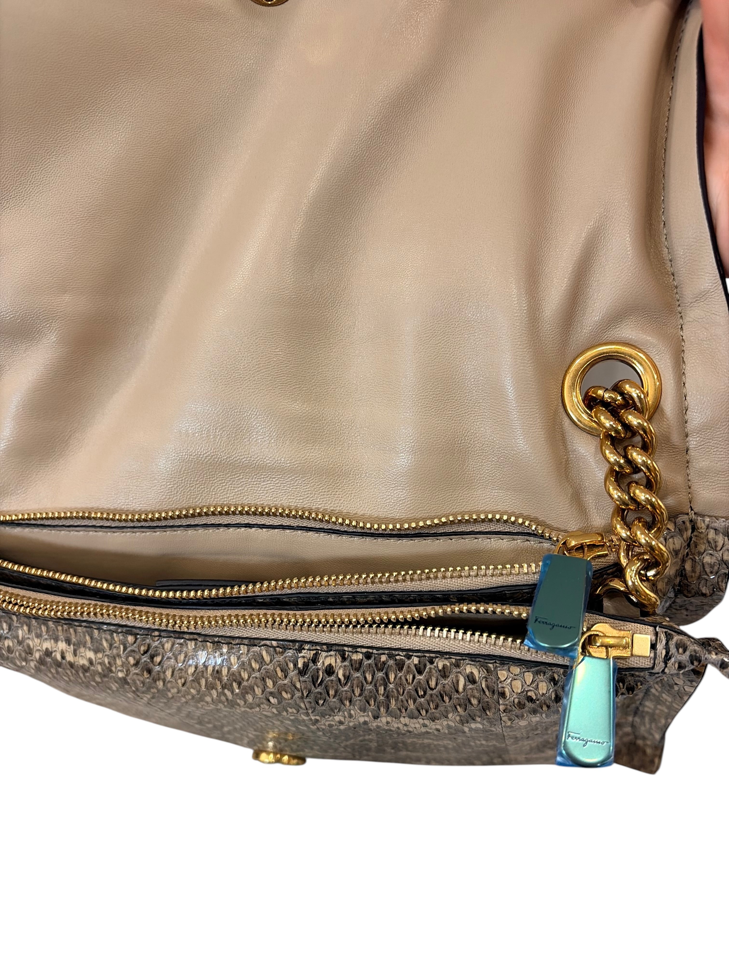 CURATED by Kira Salvatore Ferragamo snakeskin shoulder bag with gold chain strap and interior zipper compartments