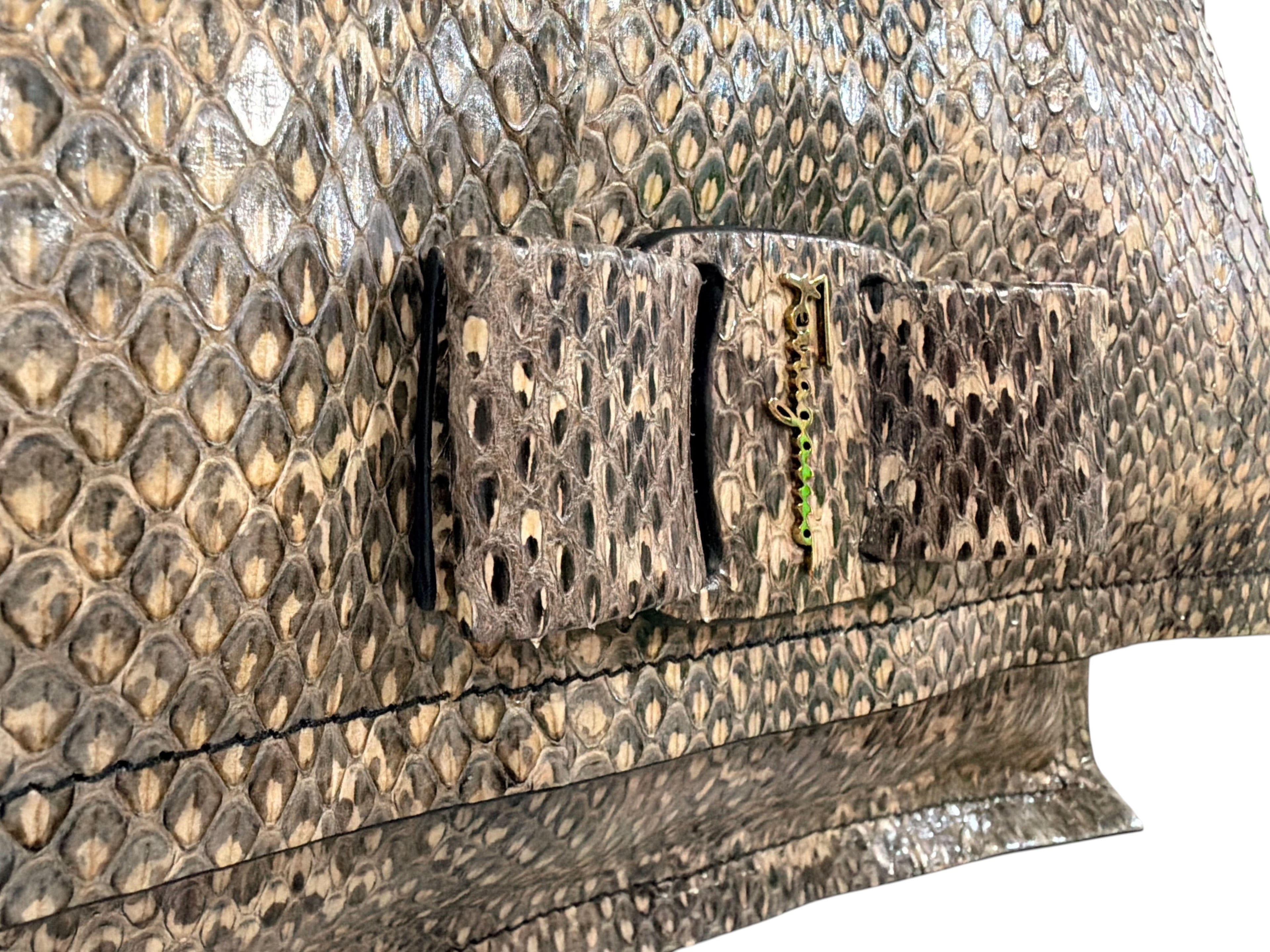 CURATED by Kira Salvatore Ferragamo snakeskin shoulder bag with a signature bow detail and natural beige tones.