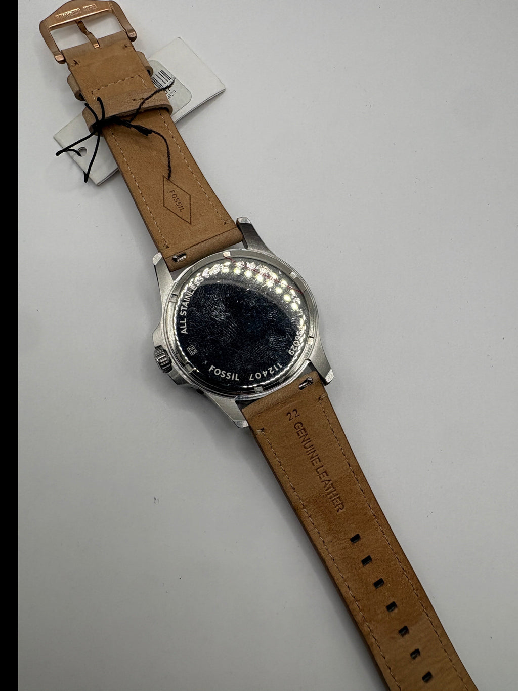 CURATED by Kira Fossil Blue dive watch back view showing stainless steel case and tan genuine leather strap
