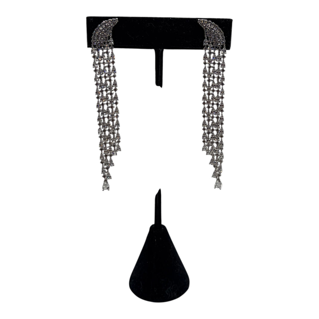 CURATED by Kira Genevive La Scène silver waterfall dangle earrings with sparkling crystal accents on a display stand