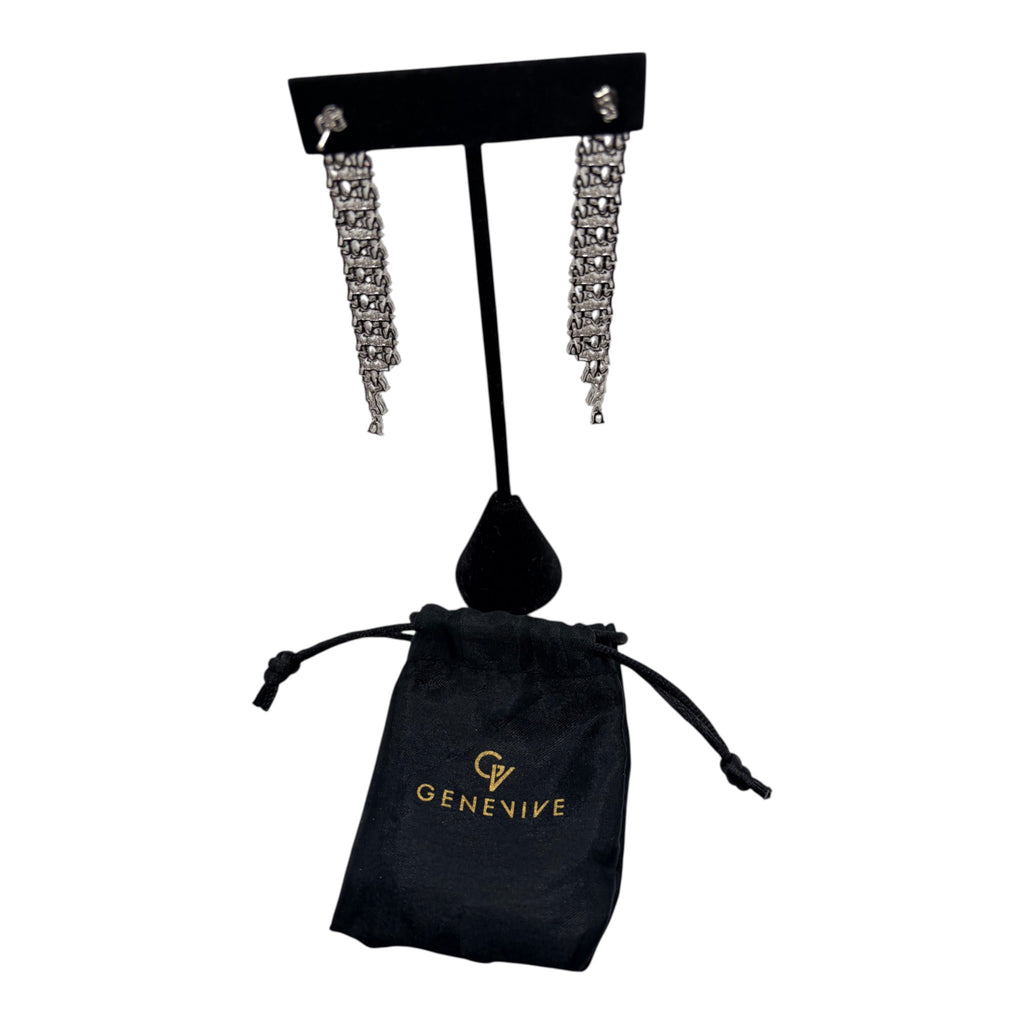 CURATED by Kira Genevive La Scène silver waterfall dangle earrings on a black display stand with branded pouch