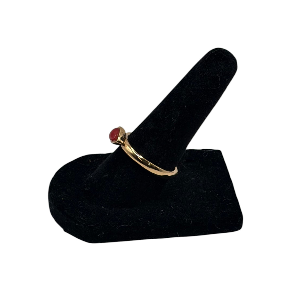 CURATED by Kira gold tone ring featuring a teardrop shaped carnelian cabochon stone on a simple band