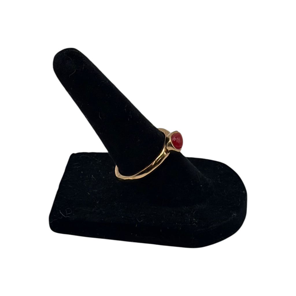 CURATED by Kira gold tone ring featuring a teardrop carnelian cabochon stone on a simple band