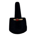 CURATED by Kira gold tone ring featuring a teardrop shaped carnelian cabochon stone on a simple band