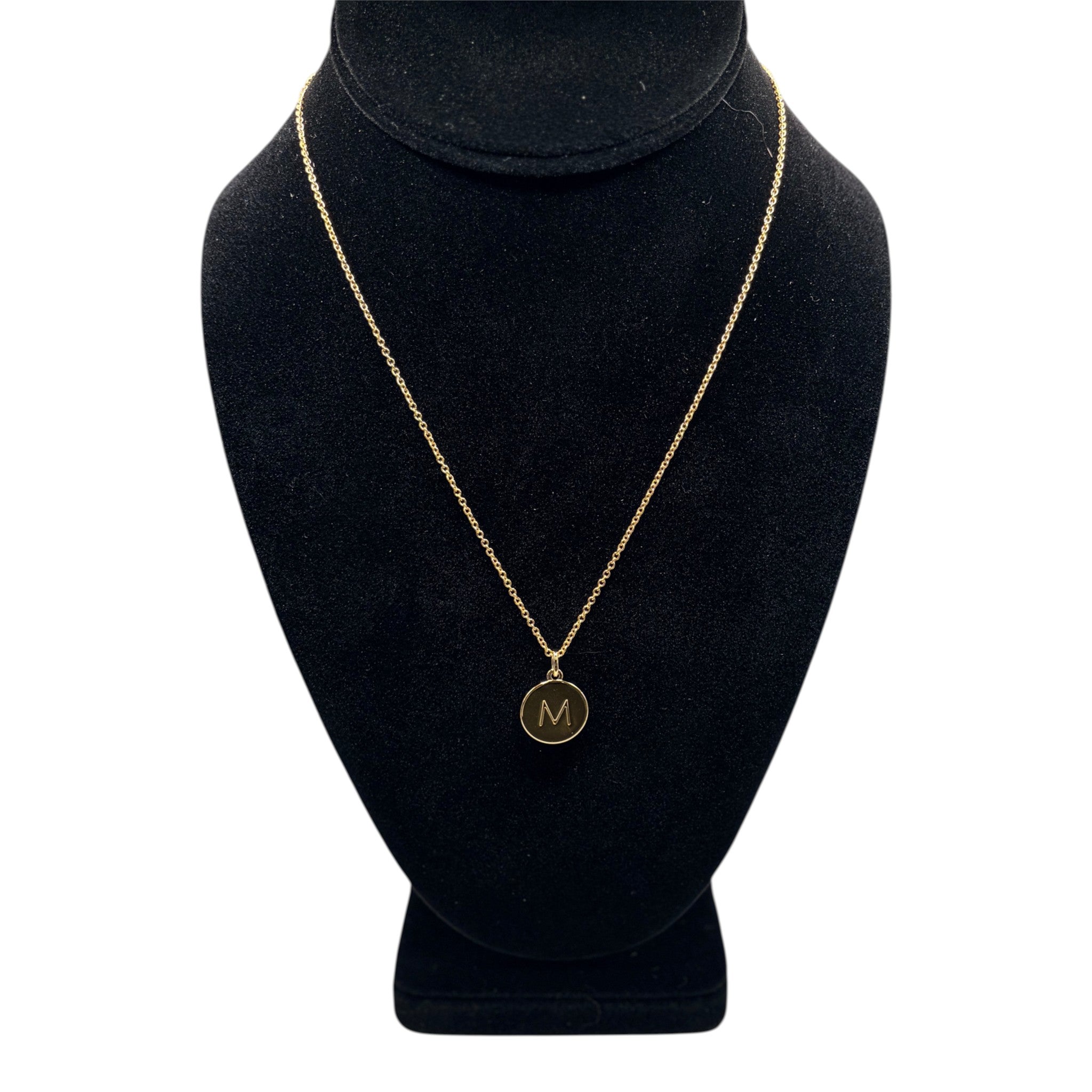 CURATED by Kira gold Kate Spade New York mini pendant necklace featuring a circular charm with the initial M