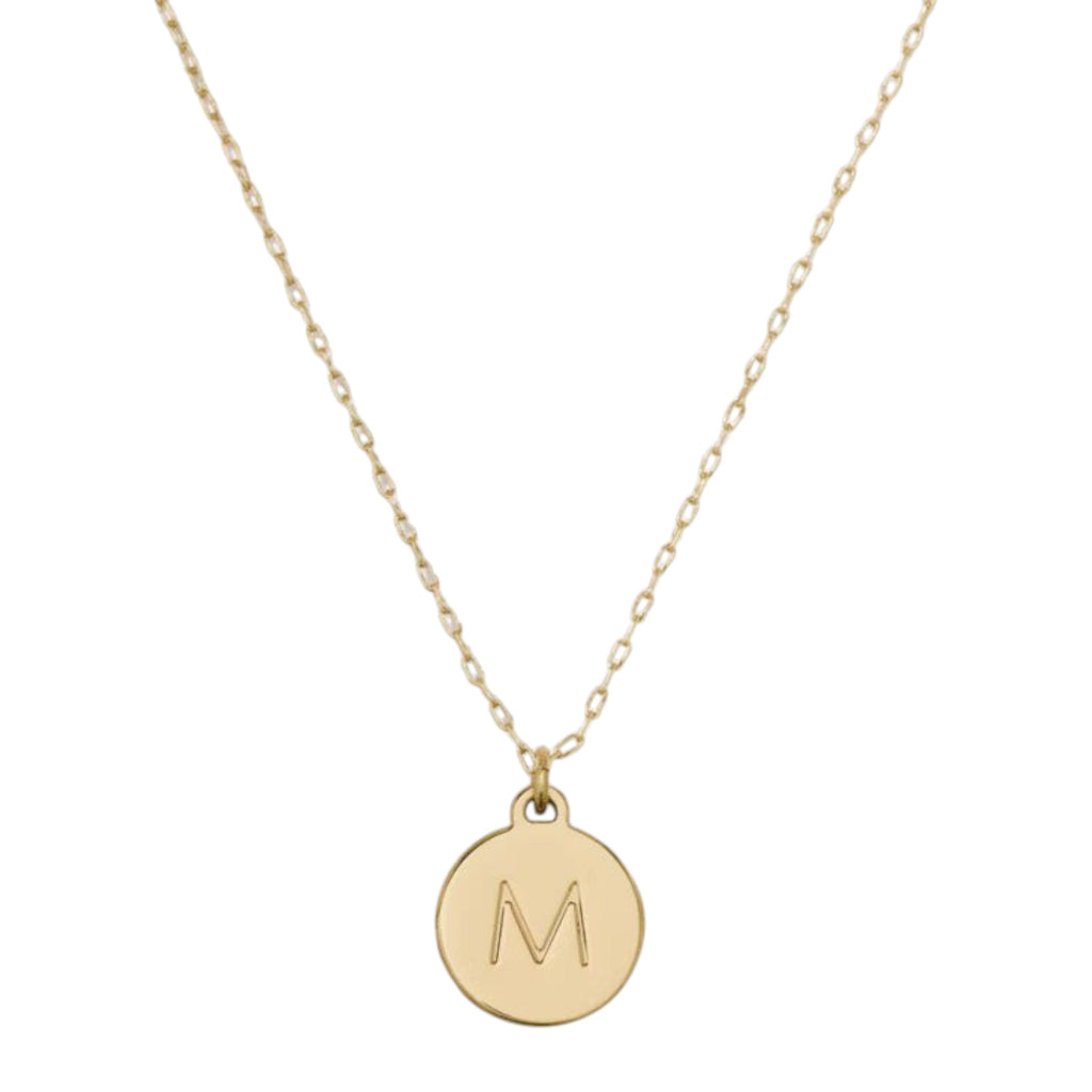CURATED by Kira gold Kate Spade New York mini pendant necklace featuring a circular charm with the initial M