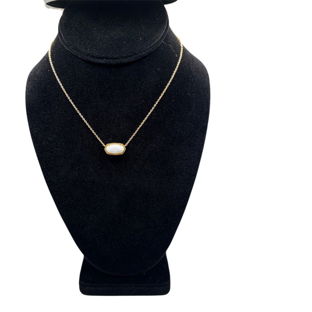 CURATED by Kira gold pendant necklace featuring an ivory mother-of-pearl stone on a delicate chain