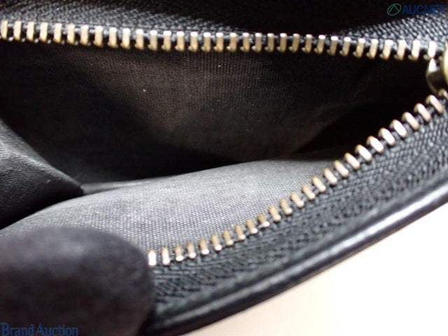 CURATED by Kira Gucci Guccissima black bi-fold wallet interior with metal zipper detail