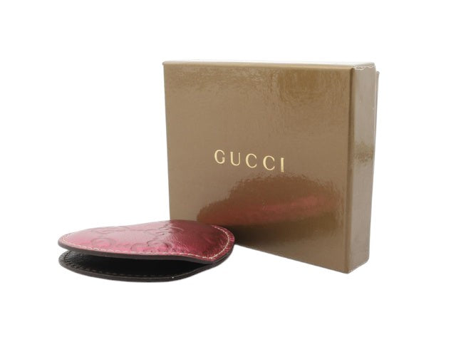 CURATED by Kira Gucci compact mirror in white with heart design and Guccissima pattern. Includes original box.