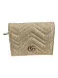 CURATED by Kira neutral Gucci GG Marmont denim wallet with matelassé chevron pattern and gold-toned double G plaque.