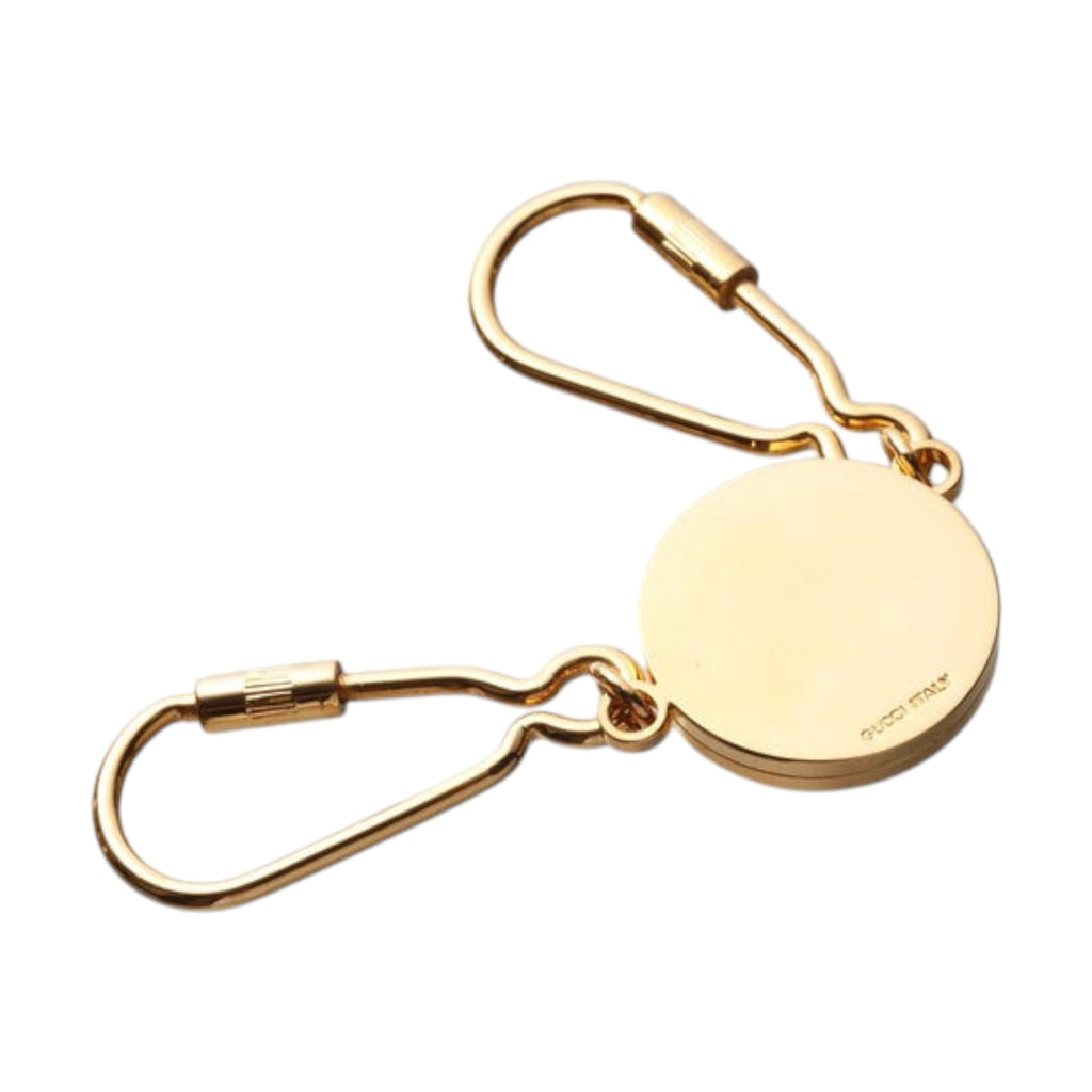 CURATED by Kira Gucci Interlocking G keyring in gold metal with dual lobster clasp attachments
