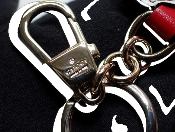 CURATED by Kira Gucci GG heart keyring in pink leather with gold-tone metal clasp and ring hardware