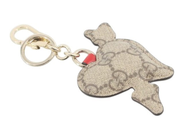 CURATED by Kira Gucci GG heart keyring in beige monogram canvas with pink accents and gold-tone hardware