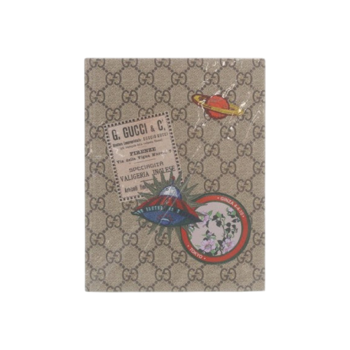 CURATED by Kira Gucci brown monogram canvas notebook featuring vintage-inspired space and floral patches