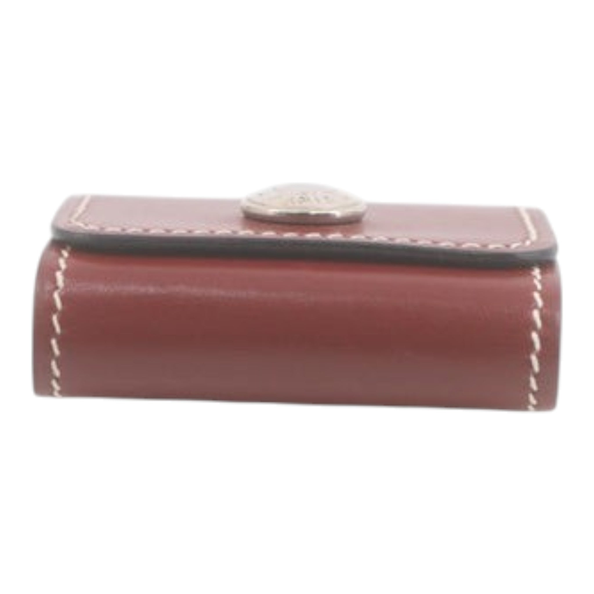 CURATED by Kira Hermes maroon leather notepad with contrast white stitching and silver button closure