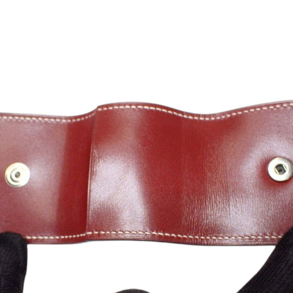 CURATED by Kira maroon leather Hermes notepad with white contrast stitching and silver snap button closure