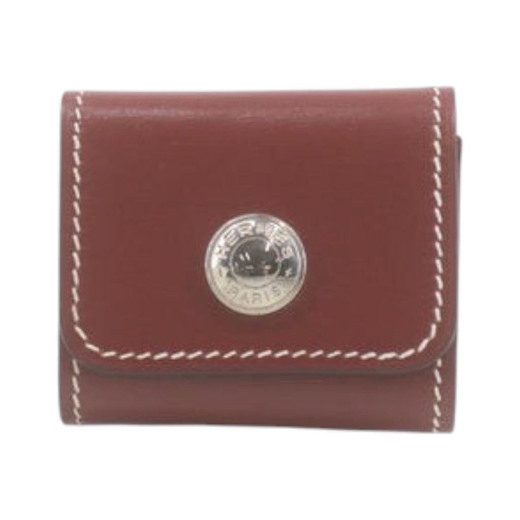 CURATED by Kira Hermes maroon leather notepad with silver button detail and white contrast stitching