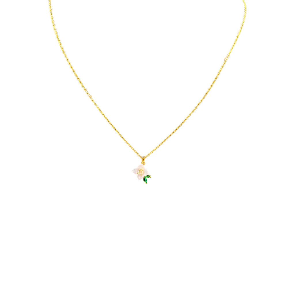 CURATED by Kira Kate Spade pendant necklace featuring a delicate white resin flower with cubic zirconia and green leaf