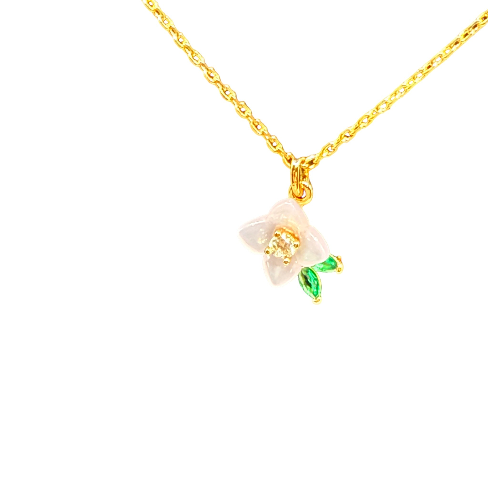CURATED by Kira kate spade new york gold chain necklace featuring a white resin flower pendant with cubic zirconia
