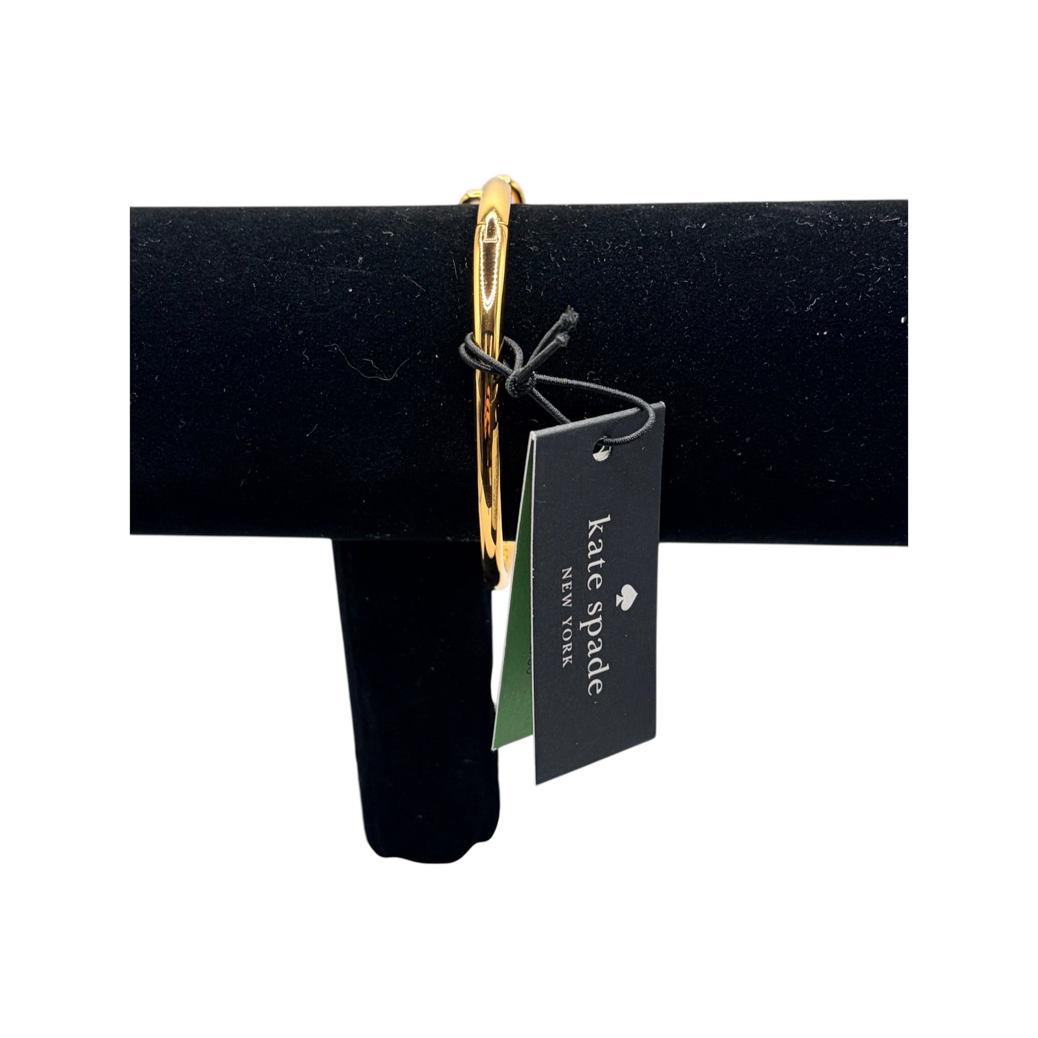 CURATED by Kira Kate Spade gold tone hinged bangle bracelet featuring a bow knot design with original store tags