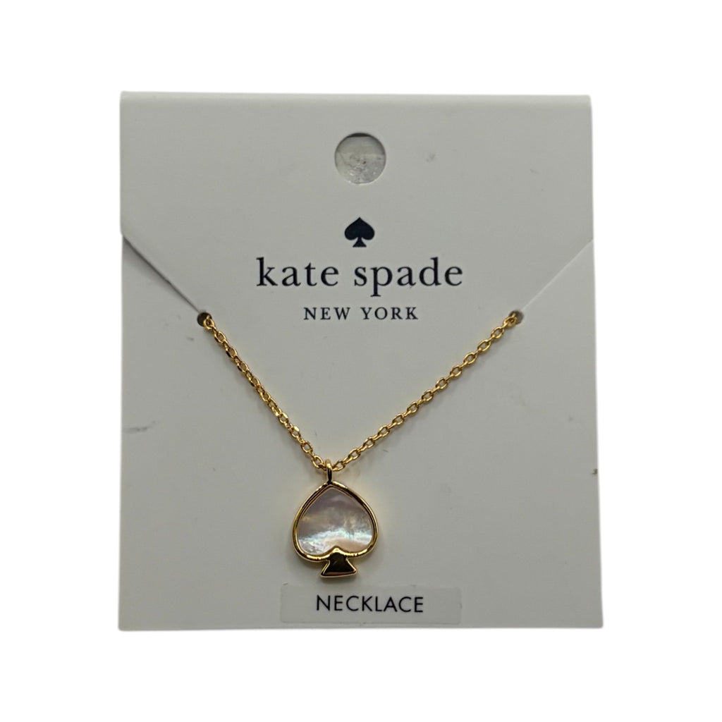 CURATED by Kira Kate Spade New York gold spade pendant necklace with iridescent mother of pearl inlay on display card