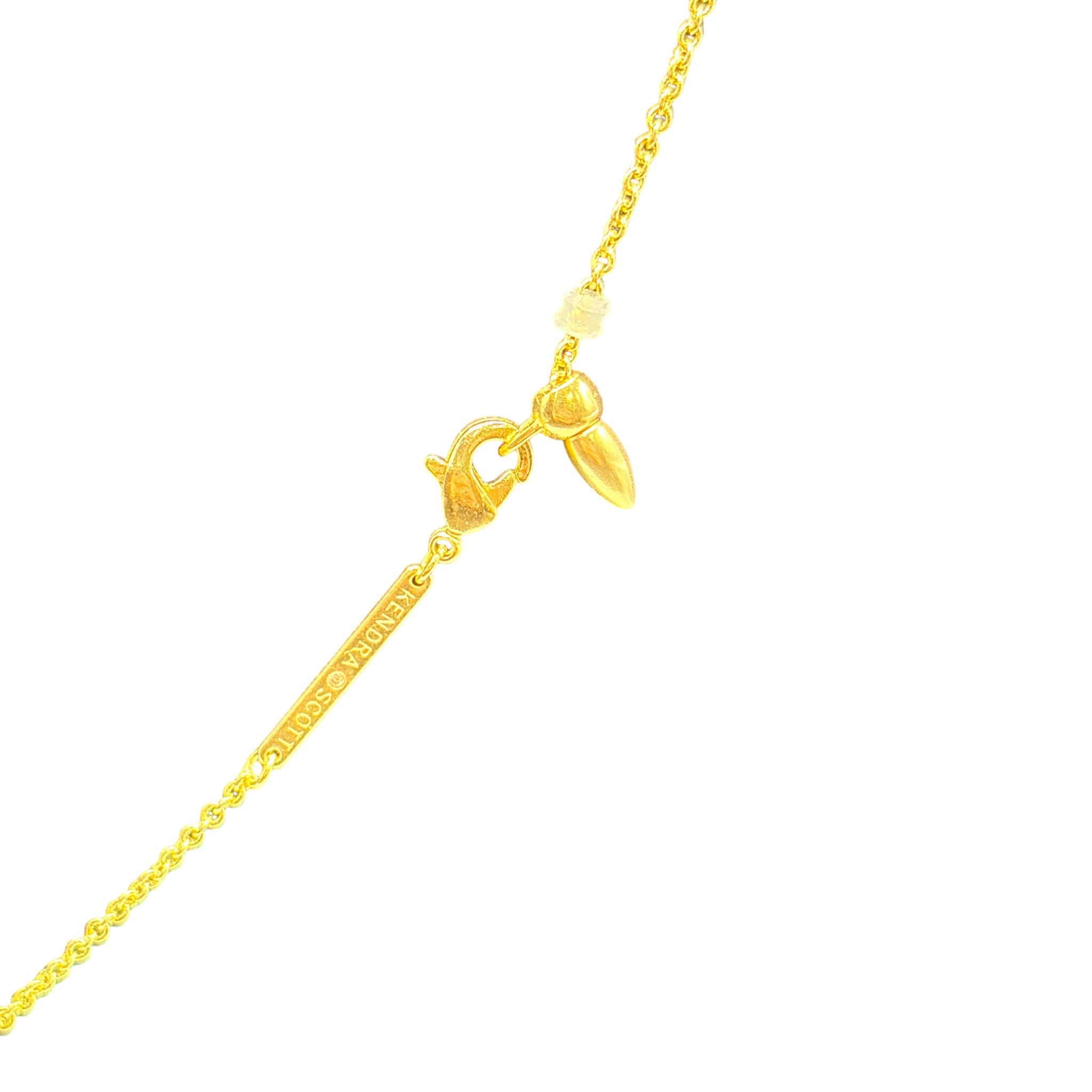 CURATED by Kira Kendra Scott Haven heart strand necklace featuring a gold chain with a lobster clasp and logo tag.