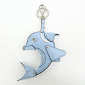 CURATED by Kira light blue Saffiano leather dolphin charm with silver hardware and Prada triangle logo.