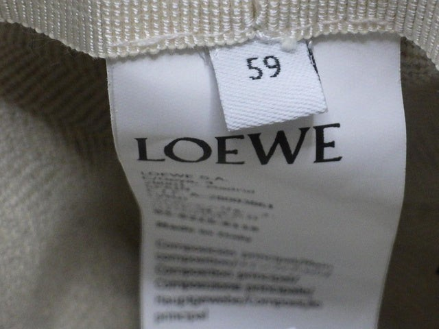 CURATED by Kira Loewe denim hat interior label showing size 59cm