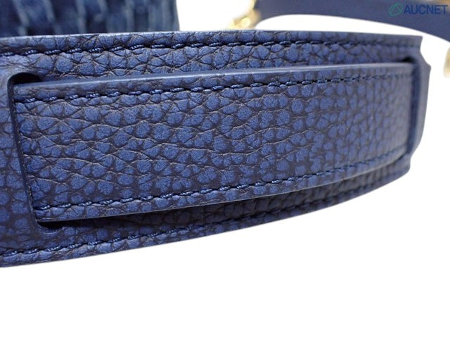 CURATED by Kira Louis Vuitton Nigo Monogram blue textured leather bag strap detail with contrast stitching