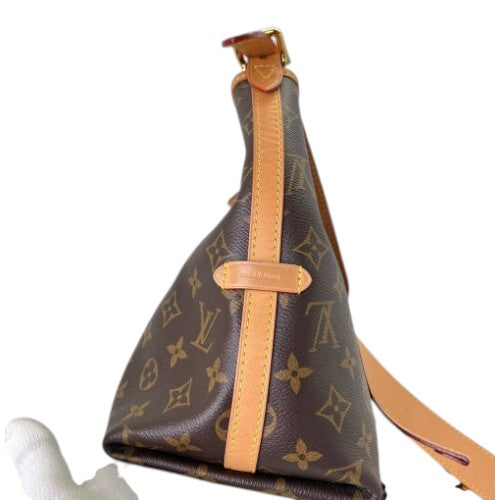 CURATED by Kira Louis Vuitton Carryall PM bag in brown monogram canvas with tan leather trim and side view