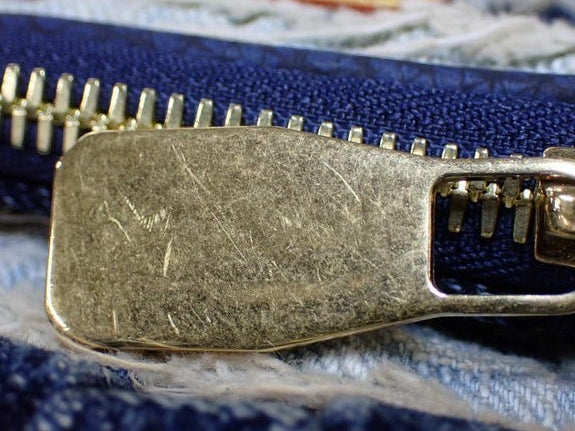 CURATED by Kira Louis Vuitton Nigo Monogram denim bag gold zipper pull detail