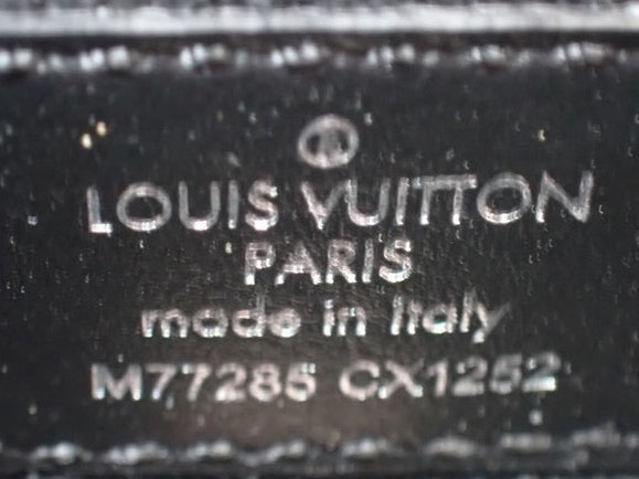 CURATED by Kira Louis Vuitton Taigarama earphone pouch interior heat stamp showing brand and model details