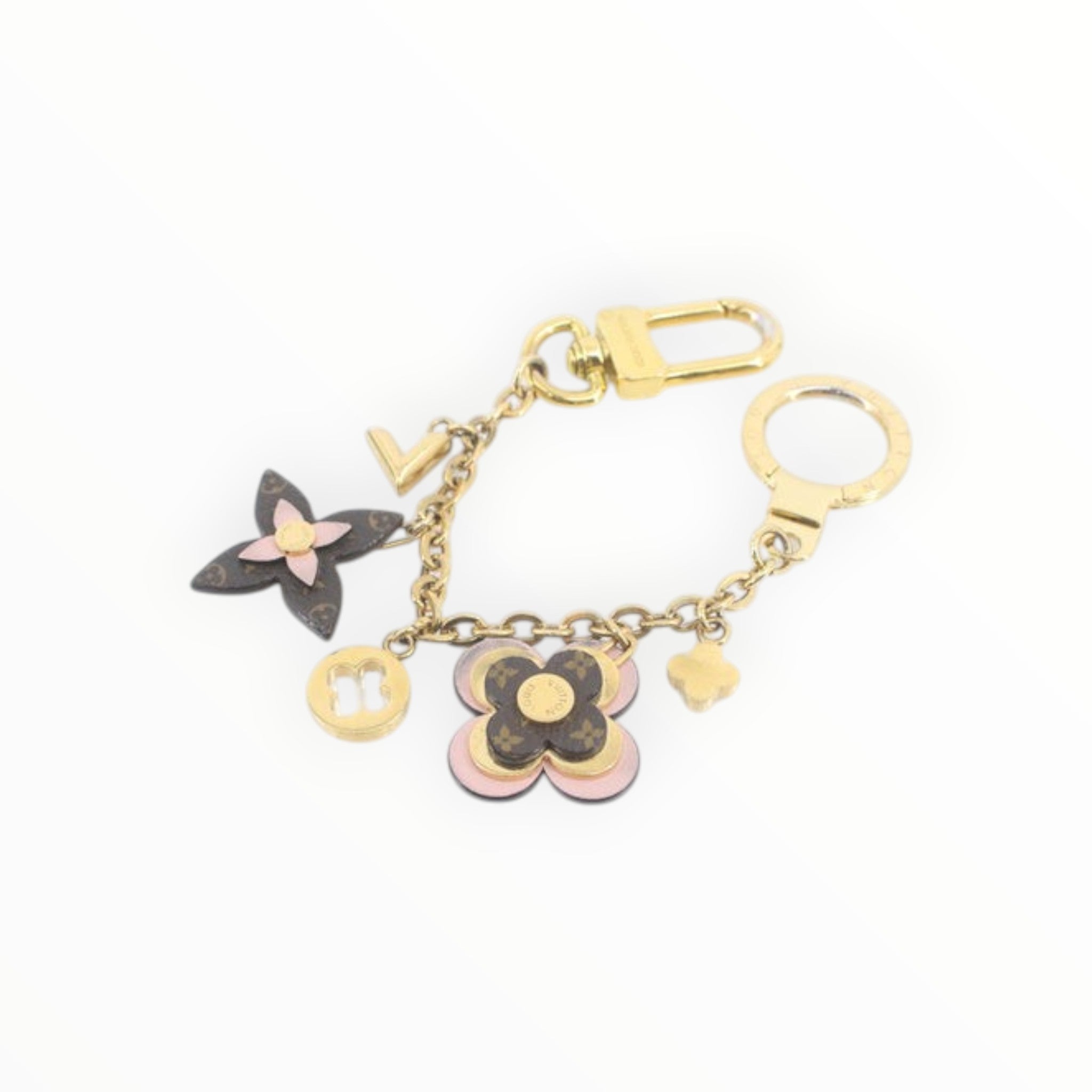 CURATED by Kira Louis Vuitton Blooming Flower bag charm and keychain in gold with signature monogram canvas accents