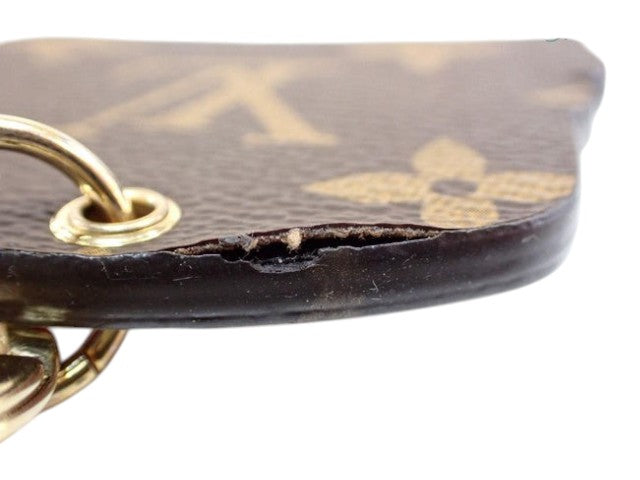 CURATED by Kira Louis Vuitton Monogram Epi Vivienne wallet showing edge wear on the brown coated canvas