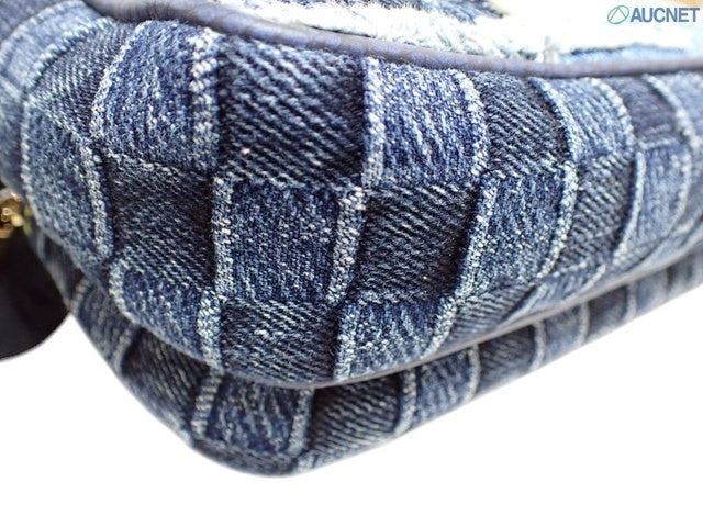 CURATED by Kira Louis Vuitton Nigo Monogram denim bag featuring a blue checkered pattern and textured fabric detail