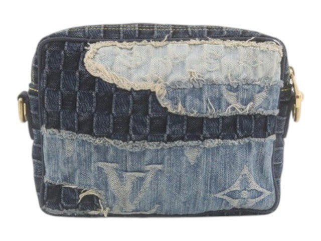 CURATED by Kira Louis Vuitton Nigo Monogram denim crossbody bag in blue with distressed patchwork details