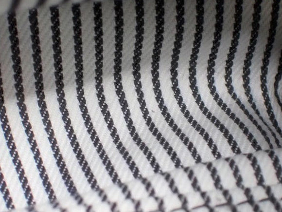 CURATED by Kira Louis Vuitton Nigo Monogram denim fabric featuring a classic blue and white striped pattern.