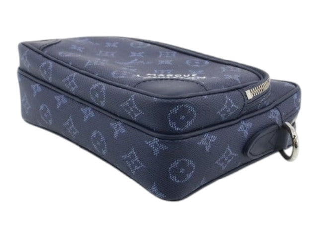 CURATED by Kira Louis Vuitton Nile NM bag in ocean blue Monogram Heritage canvas with silver hardware side view