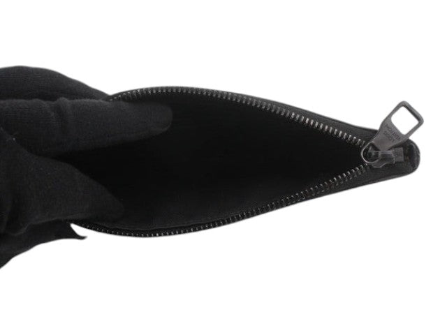 CURATED by Kira Louis Vuitton Zipped Pouch MM interior view showing dark lining and branded zipper pull