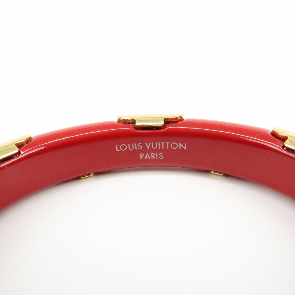 CURATED by Kira Louis Vuitton Paris red resin and gold-tone metal bangle bracelet with engraved logo