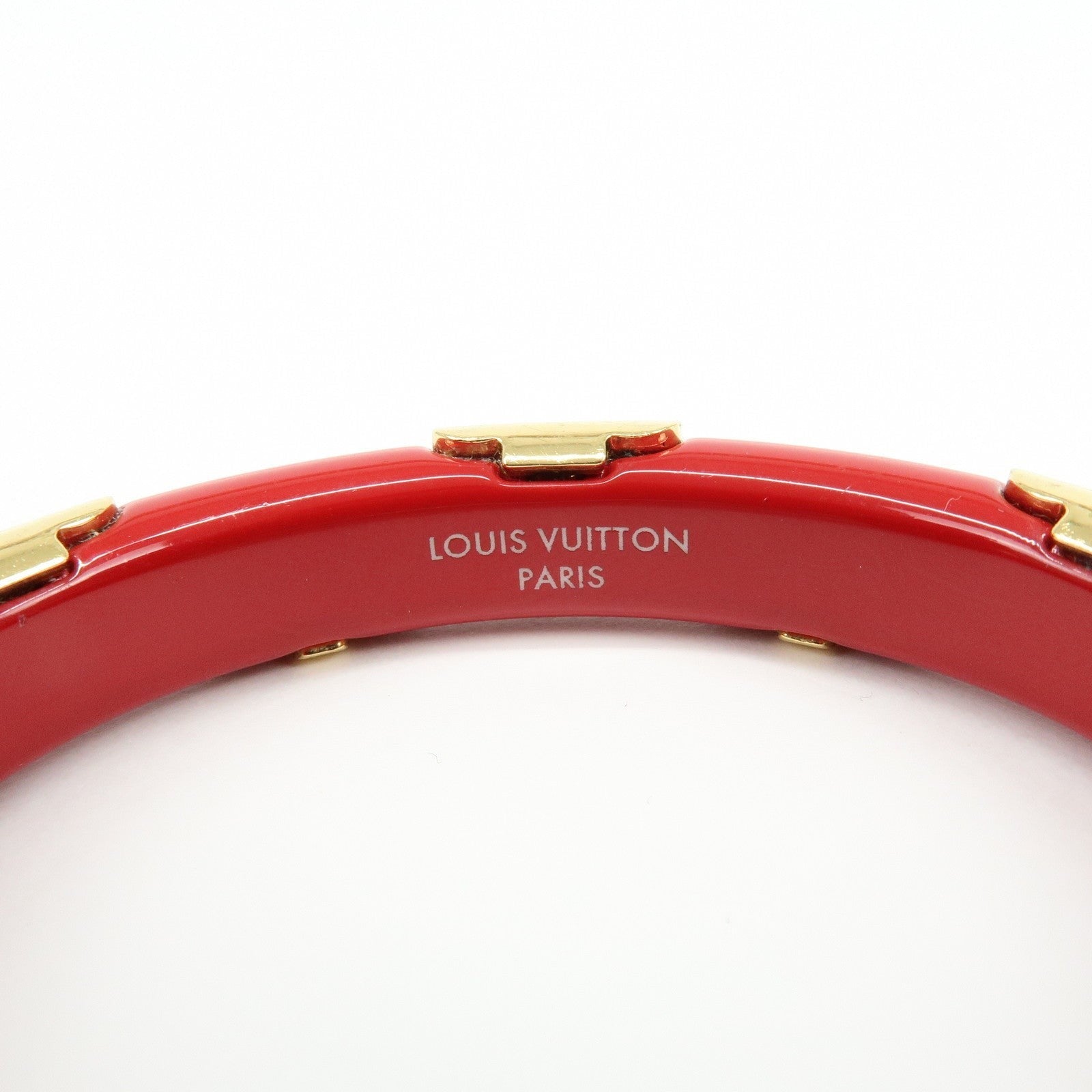 CURATED by Kira Louis Vuitton Paris red resin and gold-tone metal bangle bracelet with engraved logo