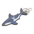 CURATED by Kira Louis Vuitton shark keychain in blue with white LV logo detailing and silver-tone metal hardware.