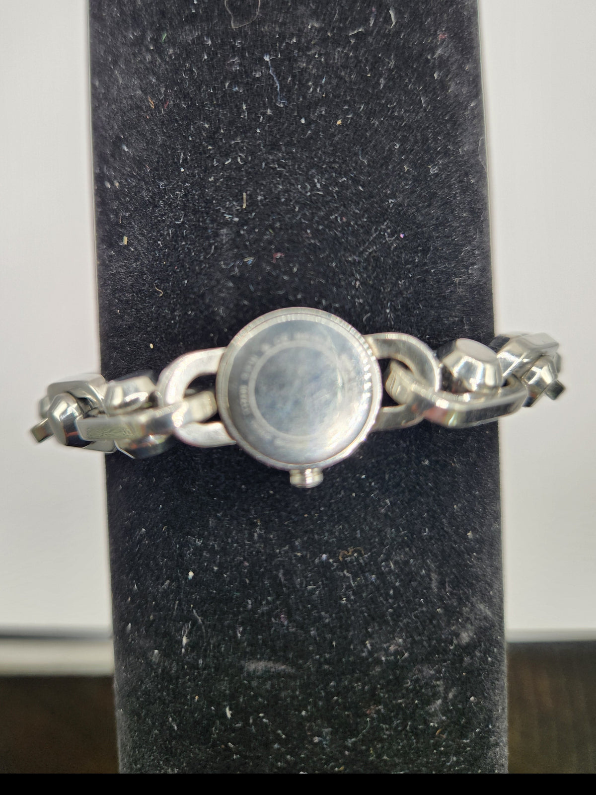 CURATED by Kira Michael Kors Astor silver stainless steel watch with chain-link bracelet shown from the back