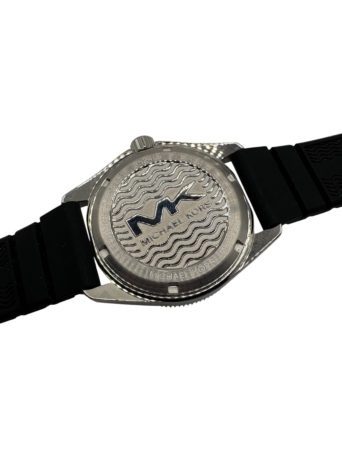 CURATED by Kira Michael Kors Maritime watch case back featuring engraved wave pattern and stainless steel finish